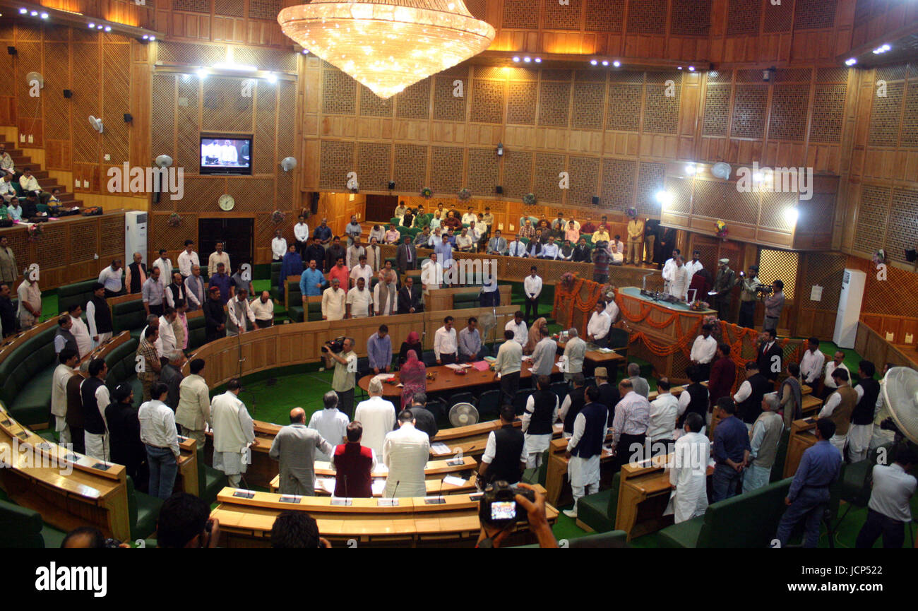 Srinagar, Indian Administered Kashmir:17 June. The ruling party( PDP) and opposition .National Conference and Congress Two-minute silence in Assembly for victims in the The  House assembled on the opening day of special session called to debate on Goods and Services Taxes (GST), members from main opposition National Conference (NC) and Congress were on their feet raising the issue of civilian deaths in government force firing.Shouting slogans against the PDP-BJP coalition government, the opposition members refused to resume their seats despite repeated direction from Speaker Jammu and Kashmir  Stock Photo