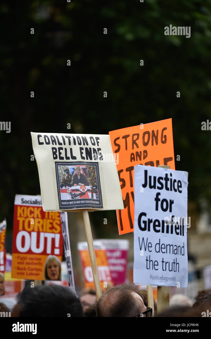 Protesters are gathering in Whitehall outside Downing Street in protest against the Conservative/DUP alliance, spurred on by grievances surrounding the Grenfell fire Stock Photo