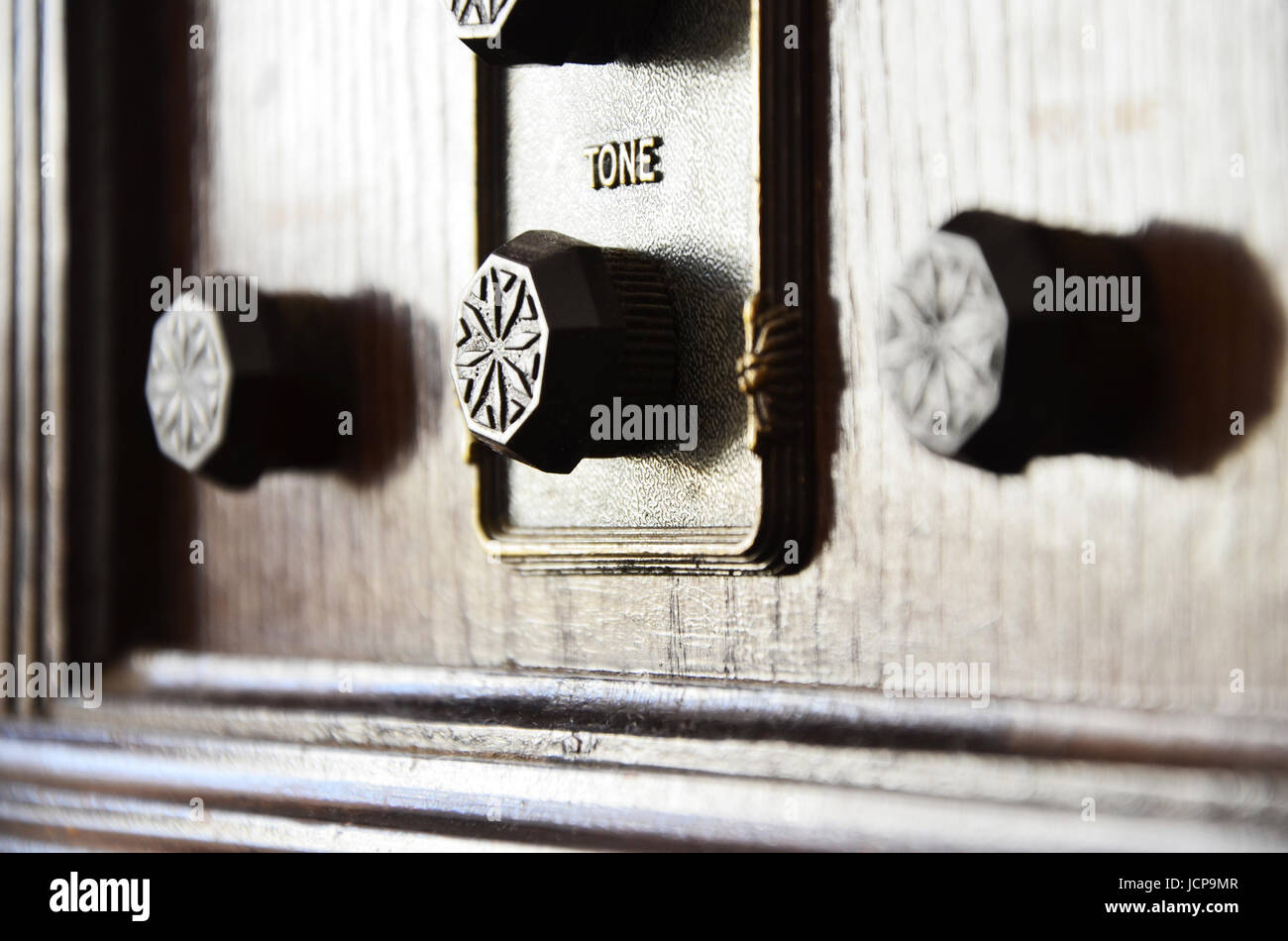 Close up view of antique wooden radio with metal knobs Stock Photo Alamy