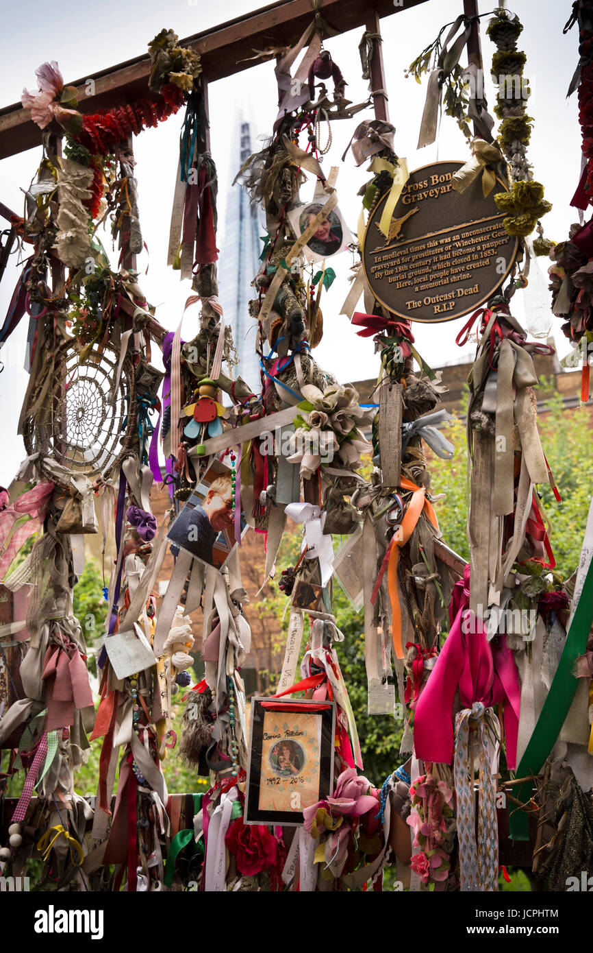 UK, London, Southwark, Redcross Way, Crossbones Garden, colourful memorials tied to graveyard railings Stock Photo