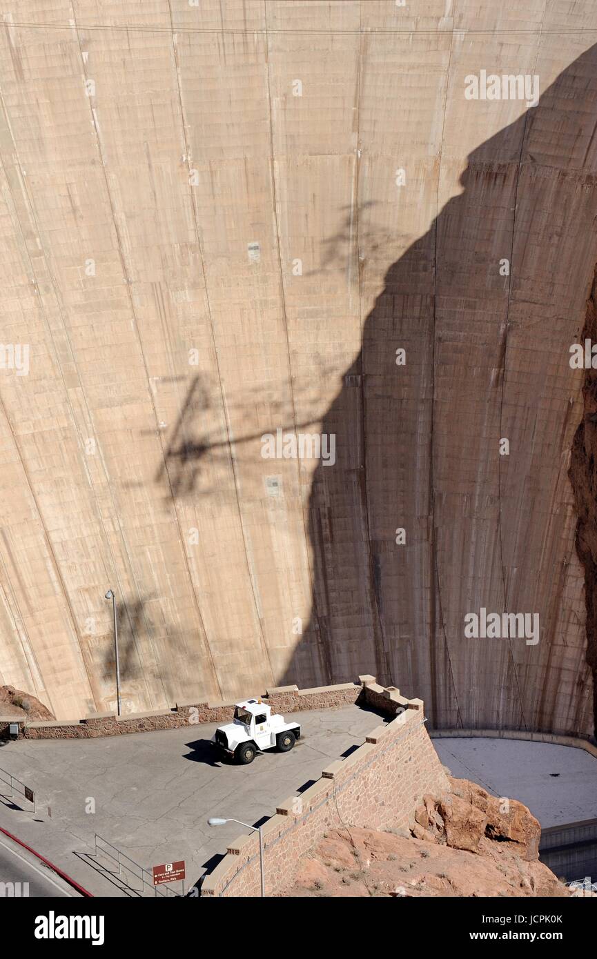 Hoover dam detail of wall and white tractor Stock Photo