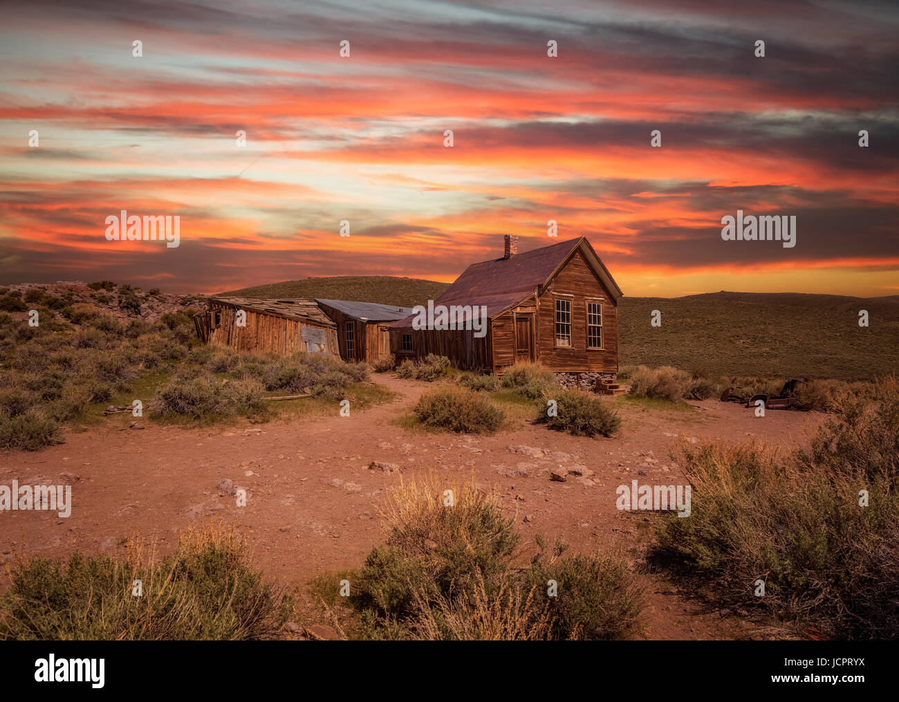 Sunset over Bodie ghost town in California. Bodie is a historic state park from a gold rush era  in the Bodie Hills east of the Sierra Nevada. Stock Photo
