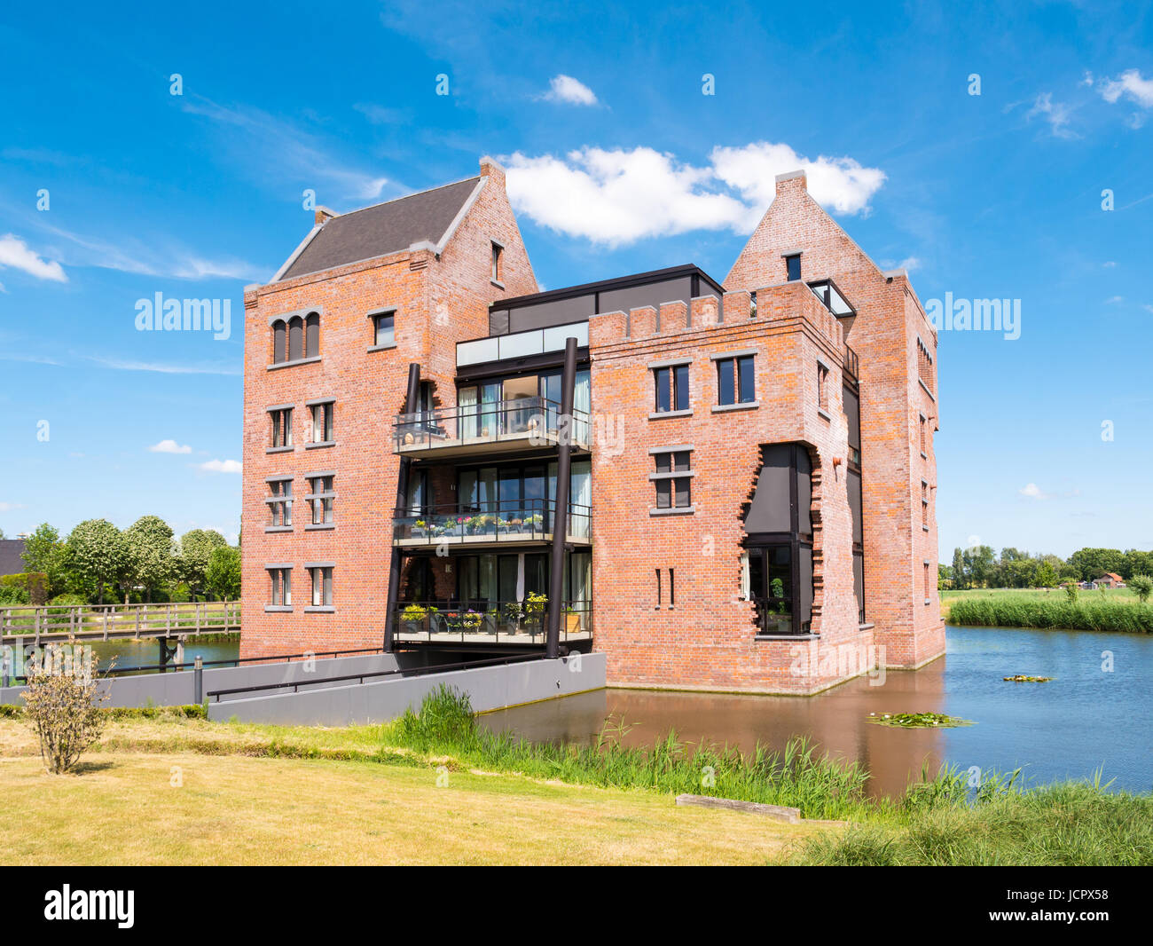 Modern waterfront apartment building in fortified town of Woudrichem, Brabant, Netherlands Stock Photo