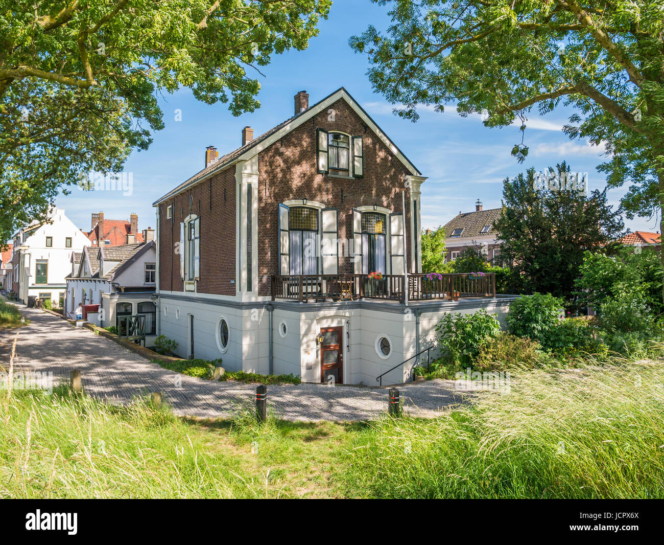 Mansion and rampart in old town of fortified city Woudrichem, Brabant, Netherlands Stock Photo