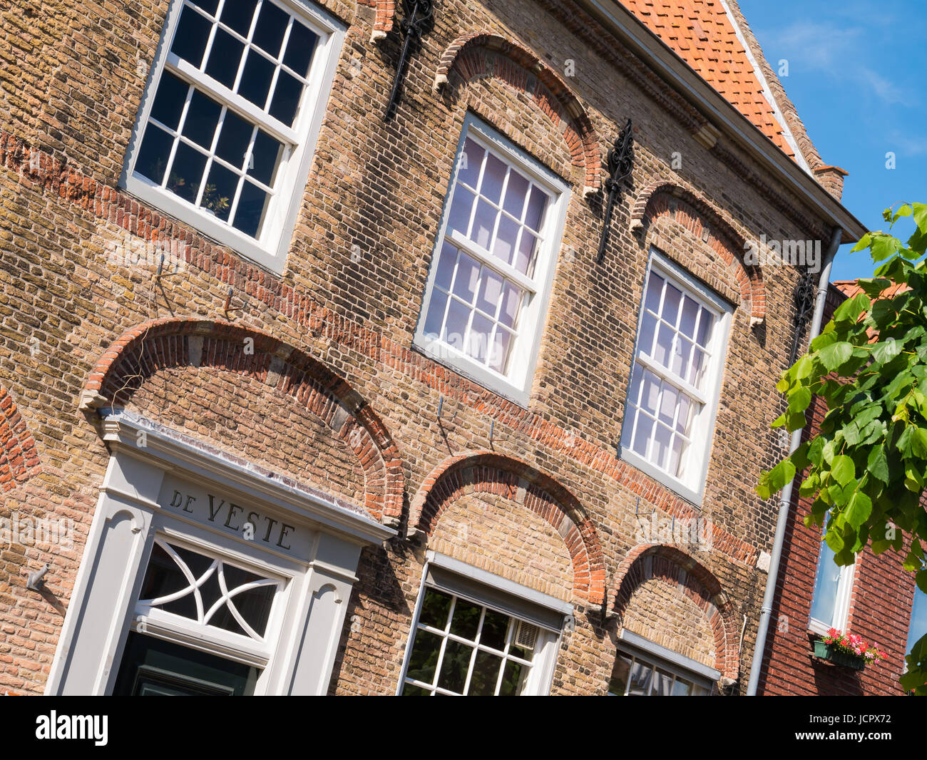 Front facade of  historic house de Veste in old town of fortified city Woudrichem, Brabant, Netherlands Stock Photo