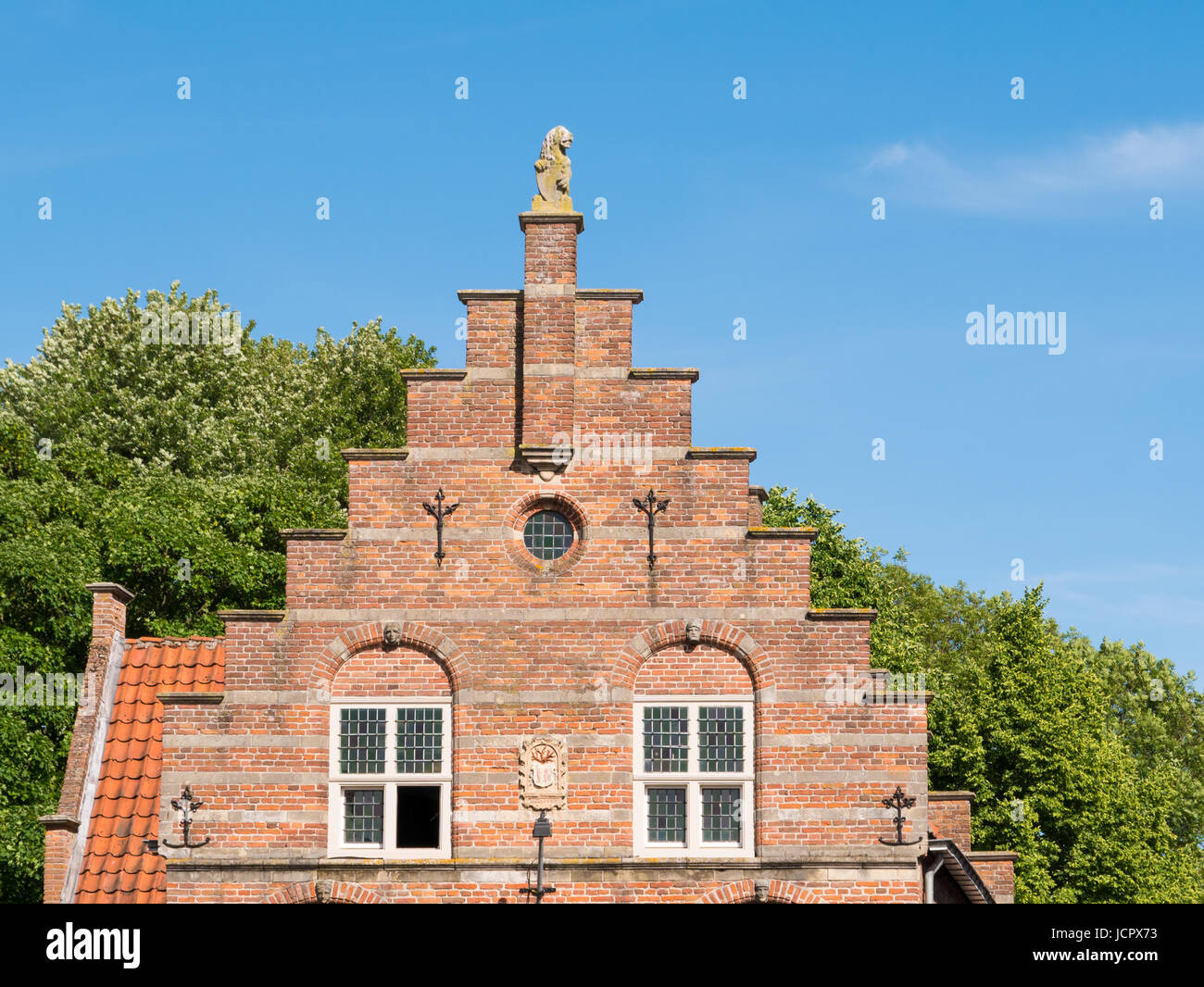 Stepped gable of old town hall in Hoogstraat in fortified city of Woudrichem, Brabant, Netherlands Stock Photo
