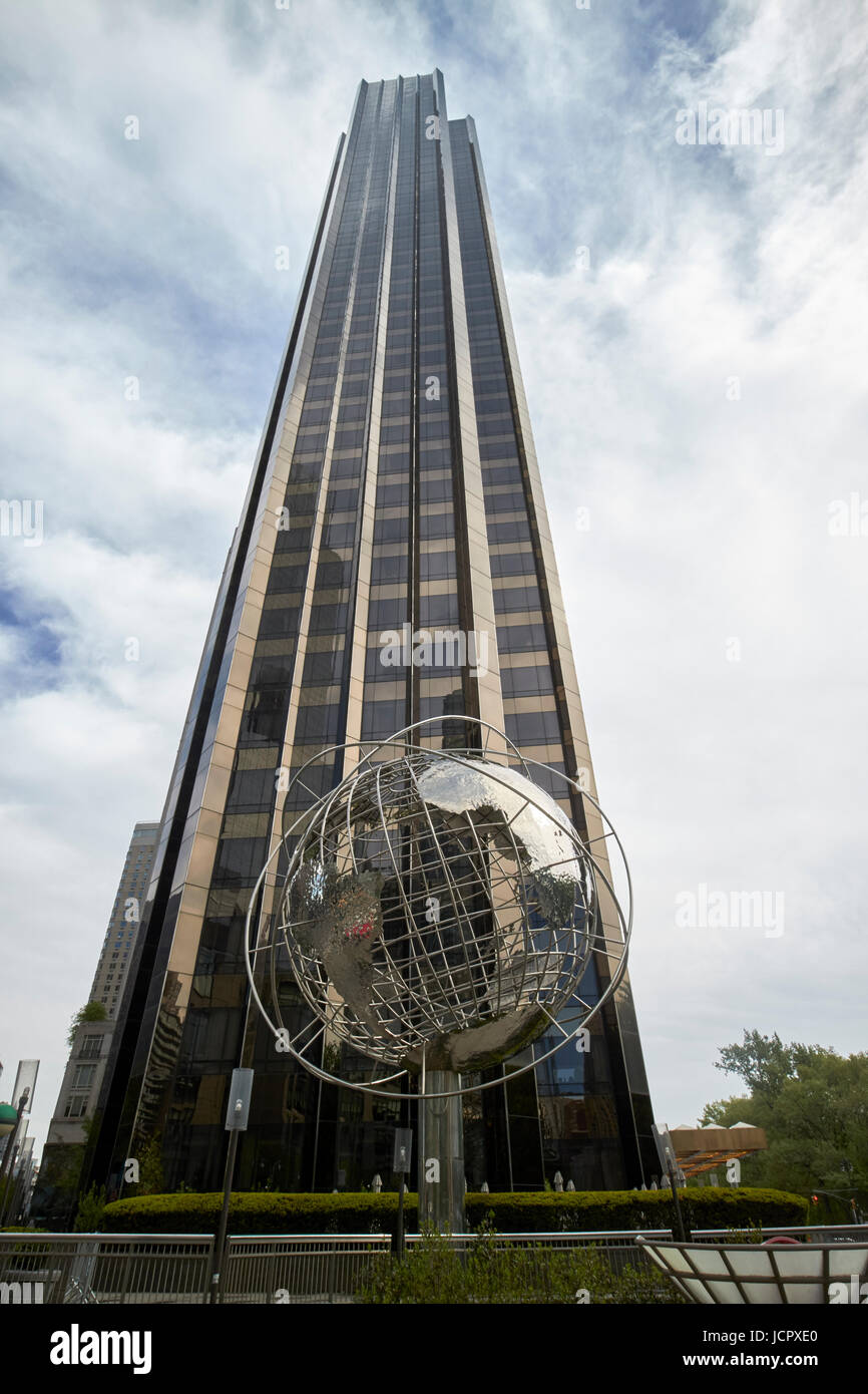 steel globe sculpture in front of the trump international hotel and tower New York City USA Stock Photo