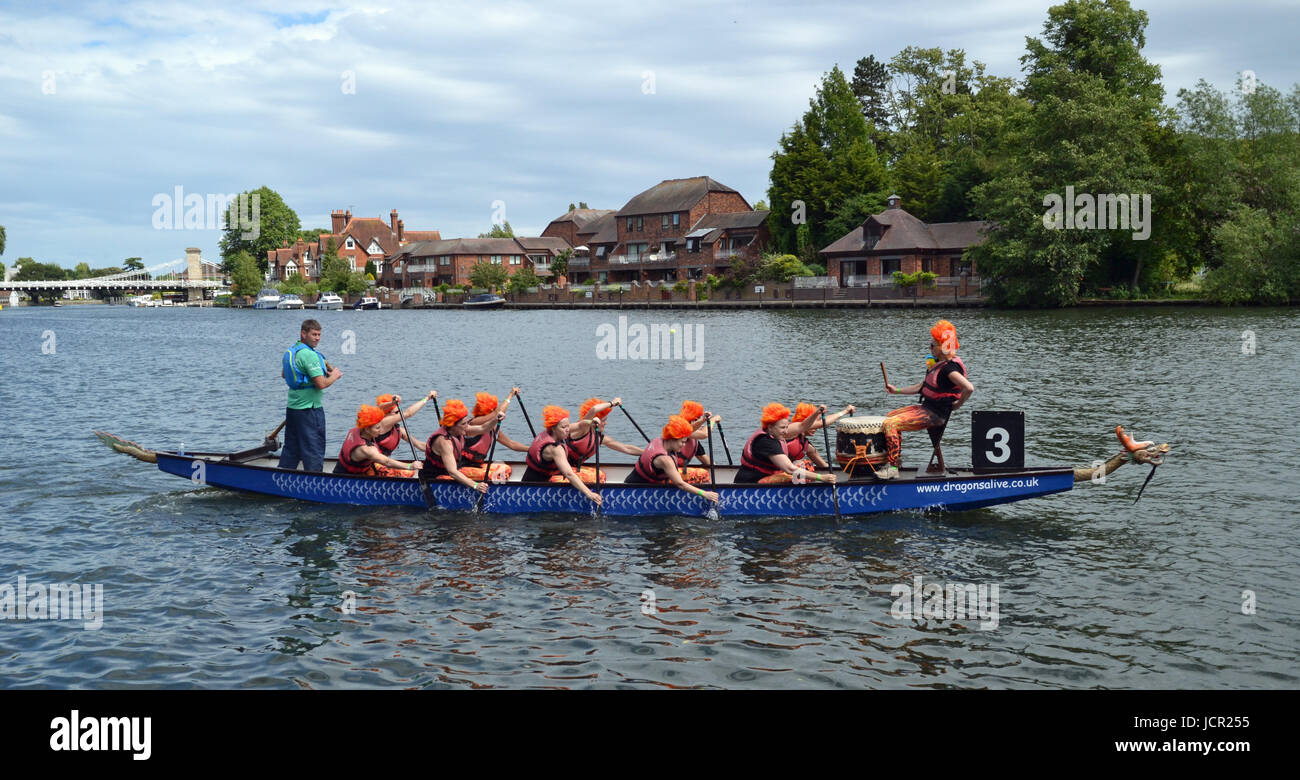 Team with firey orange hair at the Marlow dragon boat races on the River Thames, Marlow, Buckinghamshire, England, UK Stock Photo