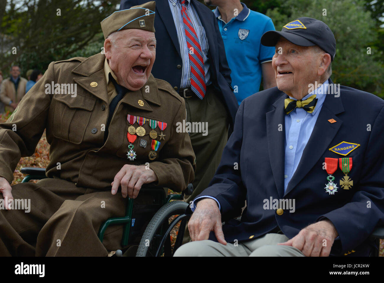 Two World War II DDay veterans share a laugh during the Charles Shay