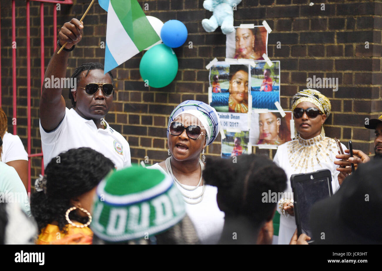 Friends of Zainab Dean gather near Grenfell Tower in west London, as she is still missing after a fire engulfed the 24-storey building on Wednesday morning. Stock Photo