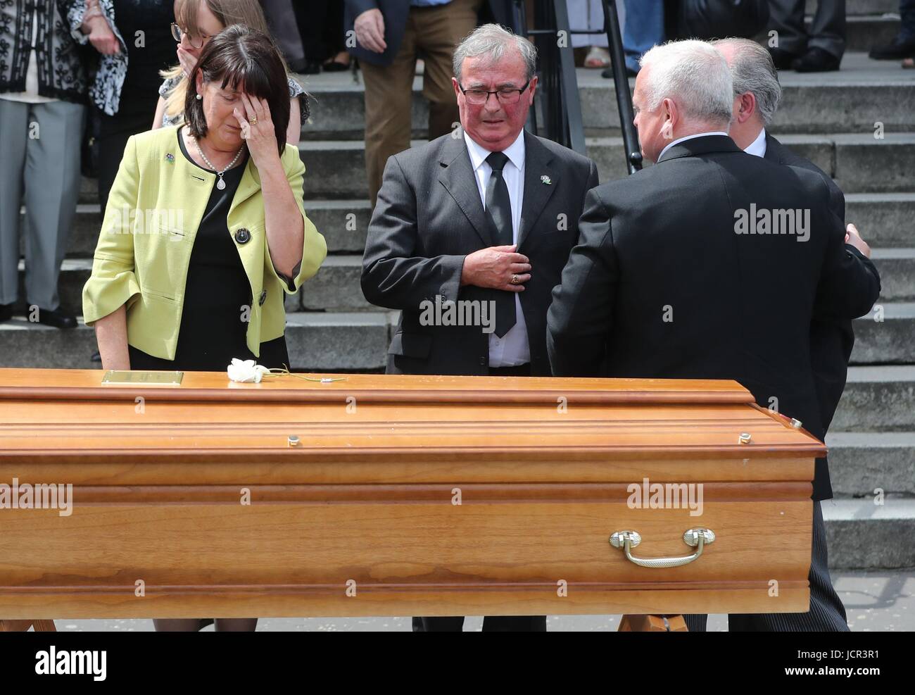 Seamus Ruddy's Sisiter Anne Morgan (Left) during his funeral at St Catherine's Dominican Chapel in Newry Co Armagh. Stock Photo