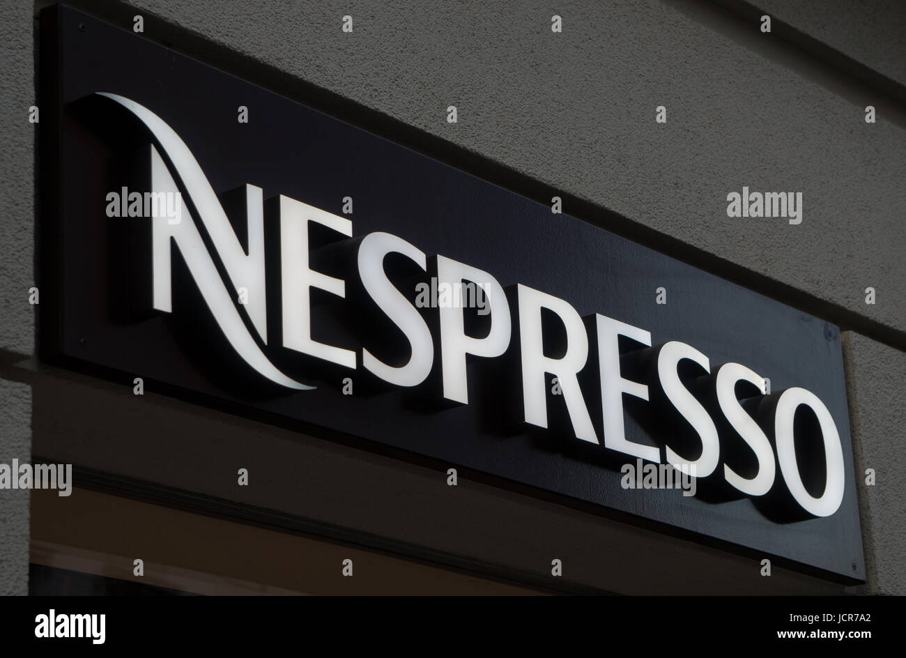 Graz, Austria - June 15th 2017: The Nespresso logo above the Graz store entrance Stock Photo