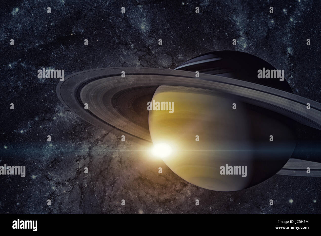 Solar System - Saturn. It is the sixth planet from the Sun and the second-largest in the Solar System. It is a gas giant planet and has a ring system. Stock Photo