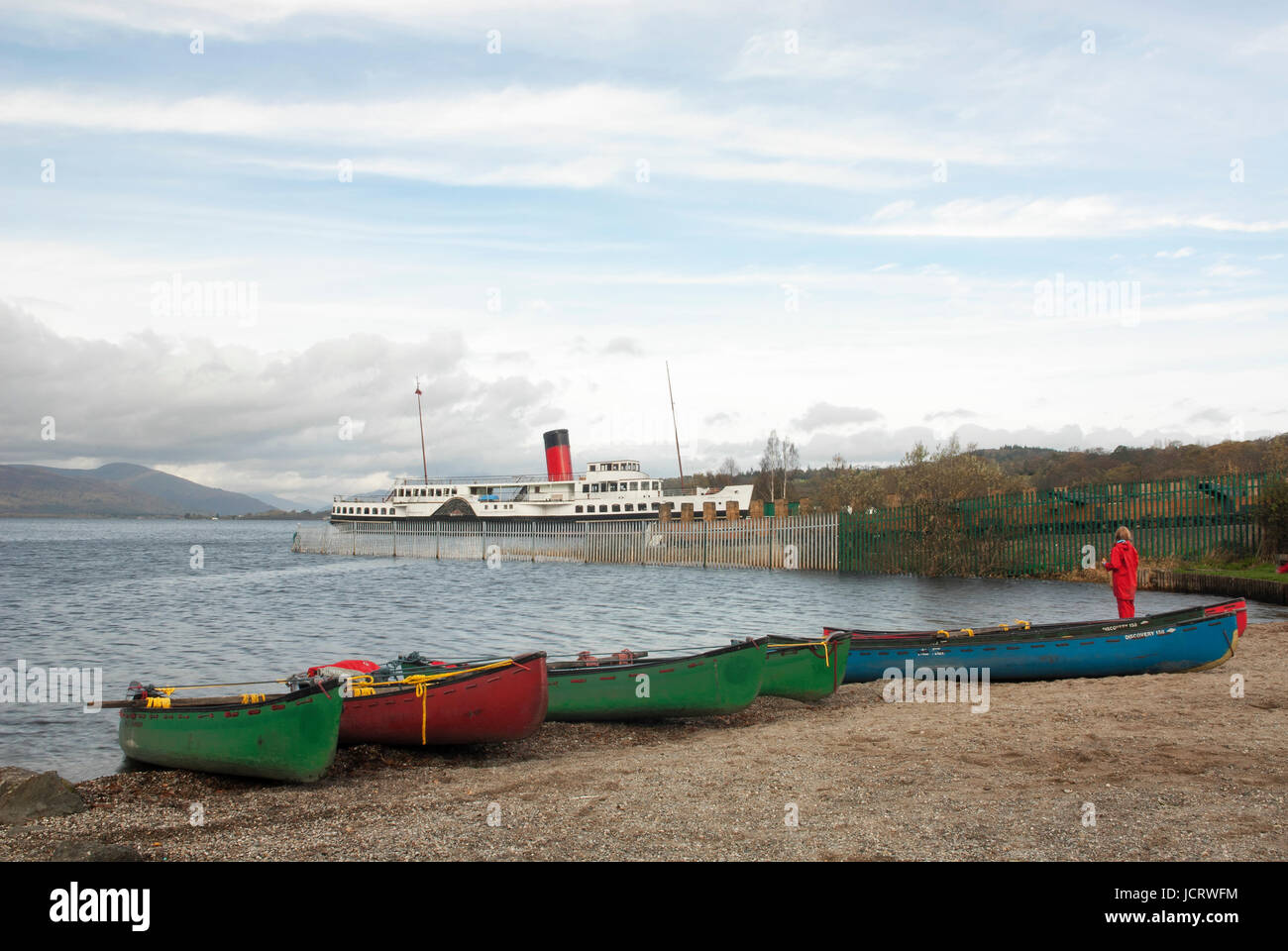 Maid of the Loch paddle steamer moored at Balloch Pier on Loch Lomond. Scotland.  Kayaks in foreground. Stock Photo