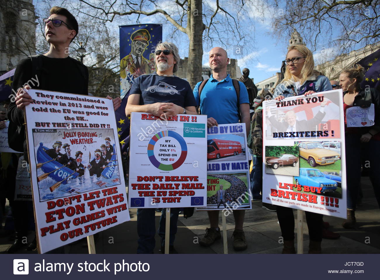Participants in a pro-EU rally at Westminster listen to an anti-Brexit speech. Stock Photo