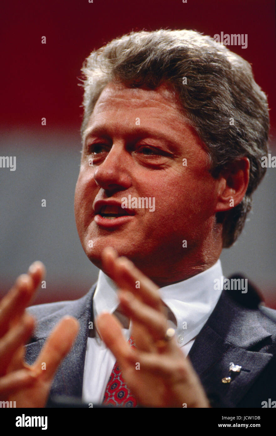 President Bill Clinton gestures while speaking Stock Photo