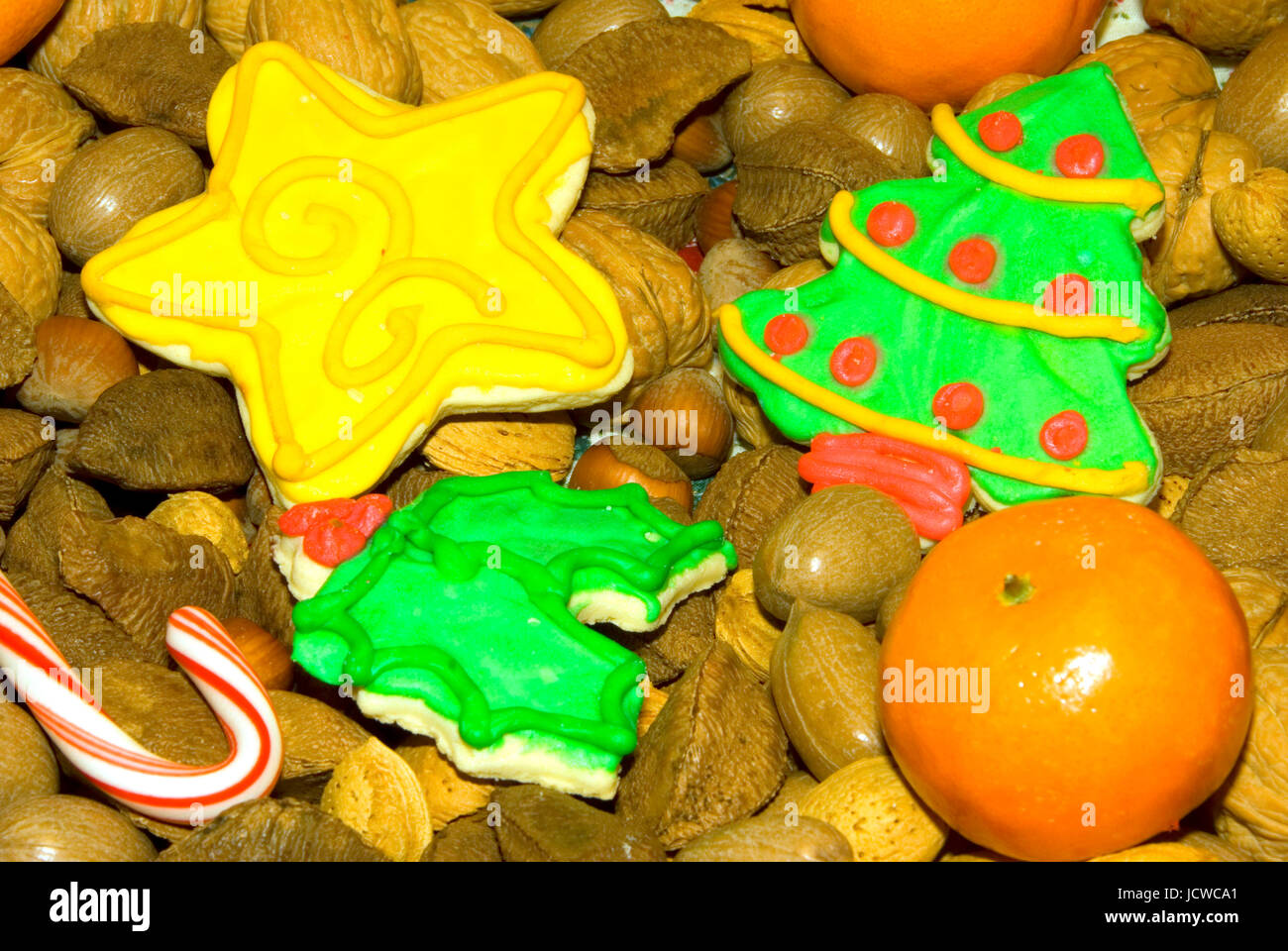 Christmas cookies with tangarines, nuts and candy canes Stock Photo Alamy