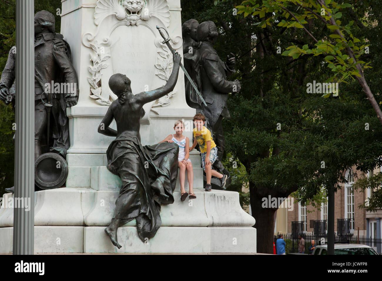 Children climbing on public statue to take pictures Washington, DC