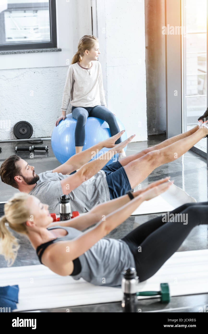 People doing gymnastics at fitness studio Stock Photo