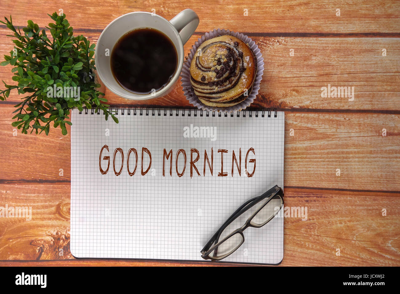Business concept of simple breakfast, coffee and croissant with note ...