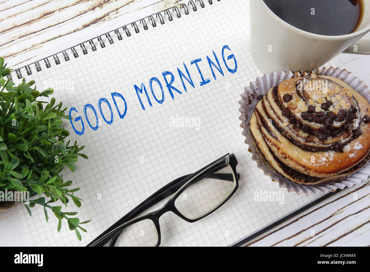 Business concept of simple breakfast, coffee and croissant with note ...