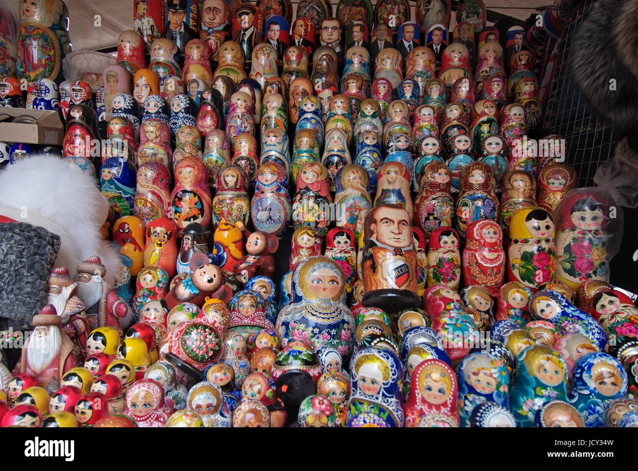 Arbat street, pedestrian street with souveniers like Russian Matryoshkas or military insignia of the Russian army, street artist, musicians, singers,  Stock Photo