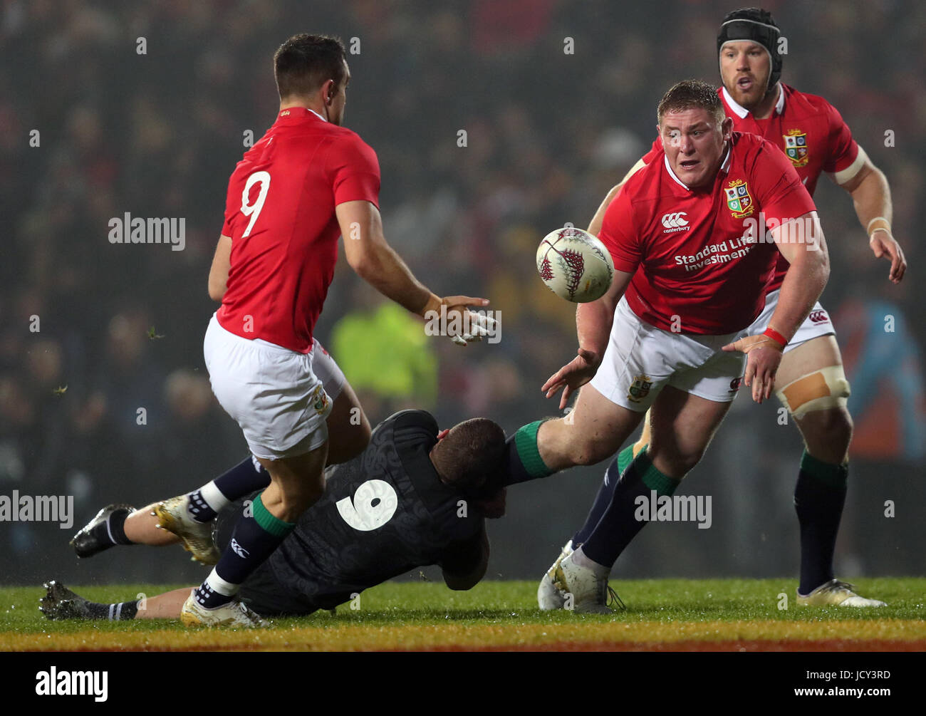 British and Irish Lions' Tadhg Furlong receives an offload from Conor Murray during the Tour match at the Rotorua International Stadium. Stock Photo
