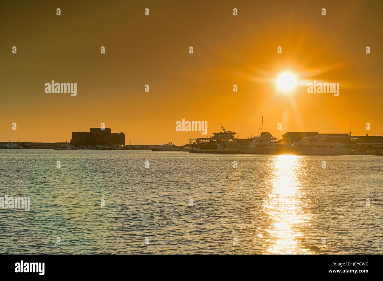 Sunset, Paphos harbour,   sea front,  Cyprus Stock Photo