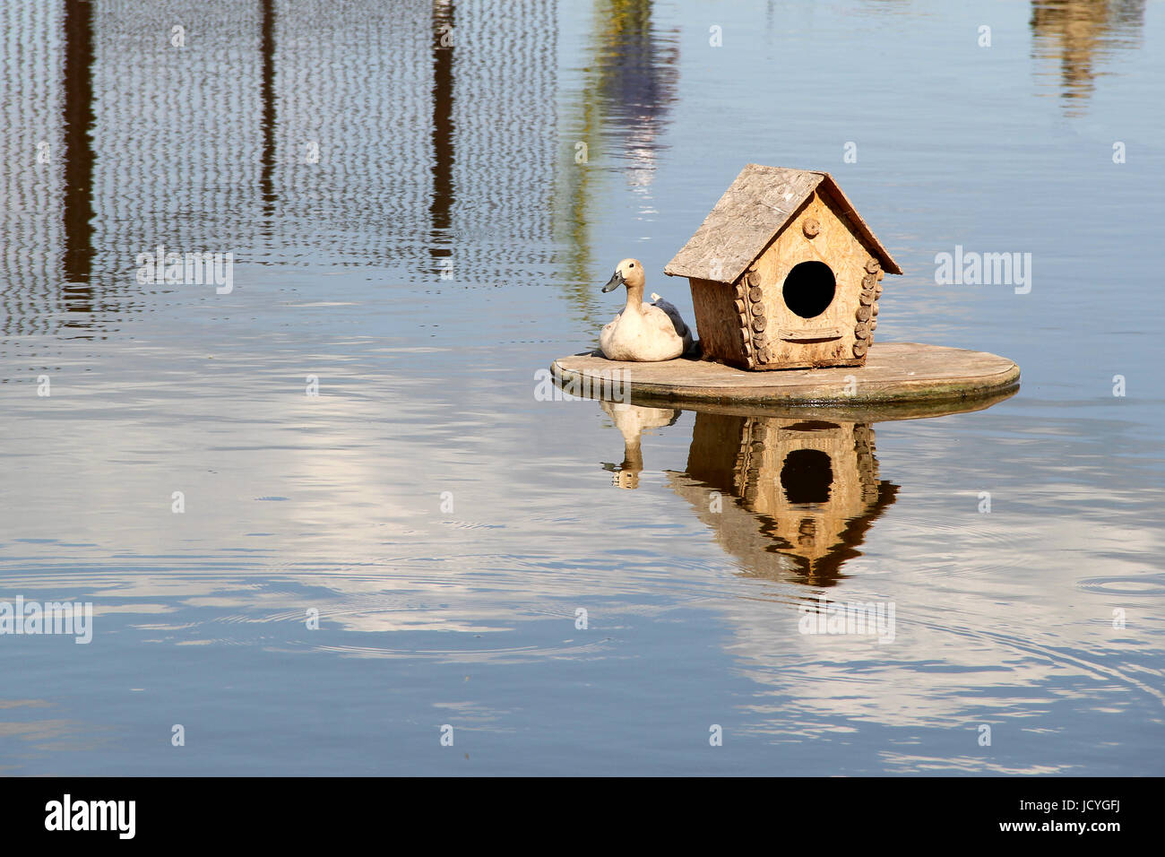 wood Duck house on the lake. photo Stock Photo