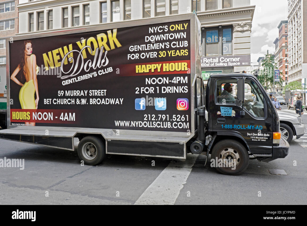 A mobile ad for a strip club on a truck on West 14th Street in lower Manhattan, New York City. Stock Photo