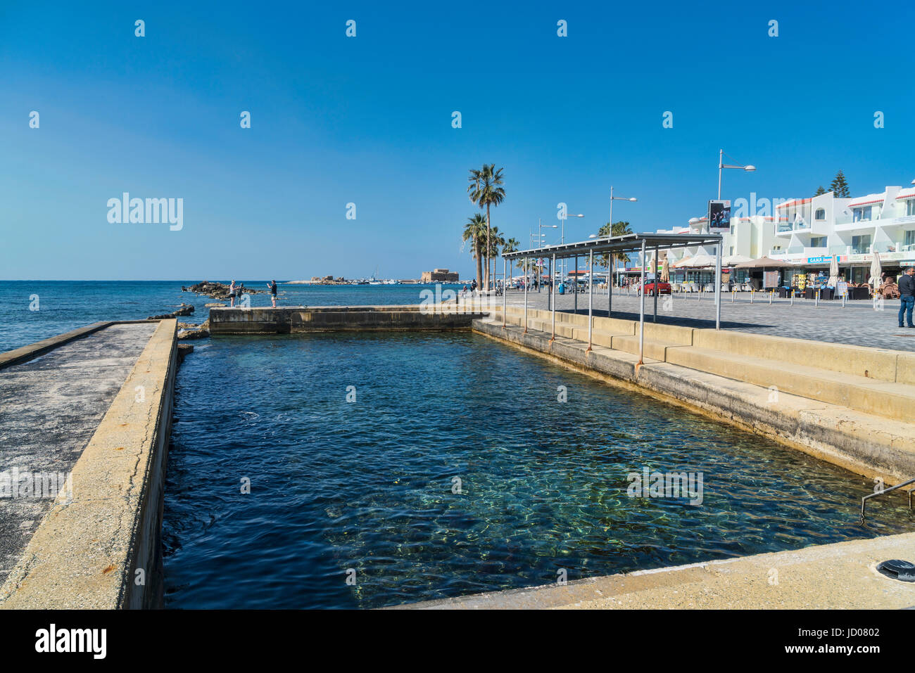 Paphos harbour, tourist area,  souvenir shops, fisherboy statue, sea front,  Cyprus Stock Photo