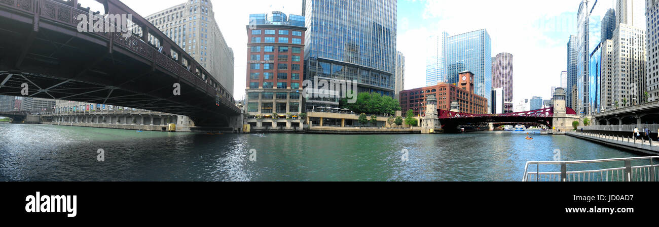 A 180º view looking north/east on the Chicago River along the River Walk towards La Salle Street from the Wells Street Bridge. Stock Photo
