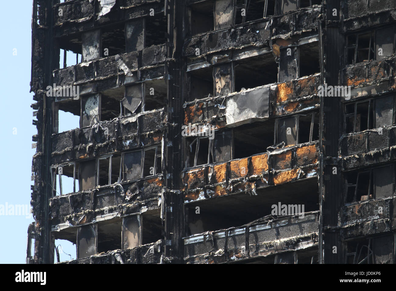 London, UK. 16th June, 2017. The charred remains of the 24-storey block Grenfell tower block located in the borough of Kensington and Chelsea where at least 30 people have bene confirmed dead with about 70 missing and feared dead. Credit: David Mbiyu/Alamy Live News  Stock Photo