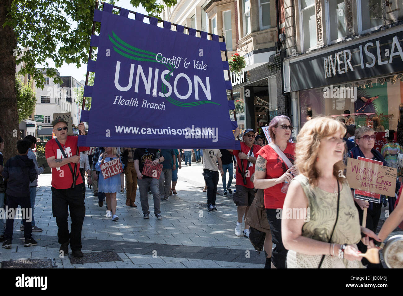 Cardiff, UK. 17th JUne, 2017. Campaigners gather under the Aneurin Bevan statue in Cardiff city centre to demand the resignation of Conservative Theresa May and protest against the deal with the Democratic Unionist Party from Northern Ireland. Taz Rahman/Alamy Live News Stock Photo