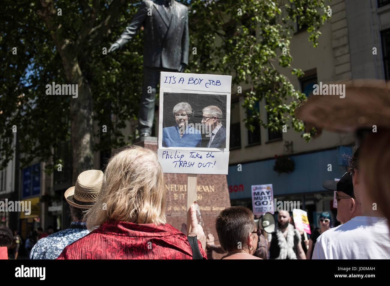 Cardiff, UK. 17th JUne, 2017. Campaigners gather under the Aneurin Bevan statue in Cardiff city centre to demand the resignation of Conservative Theresa May and protest against the deal with the Democratic Unionist Party from Northern Ireland. Taz Rahman/Alamy Live News Stock Photo