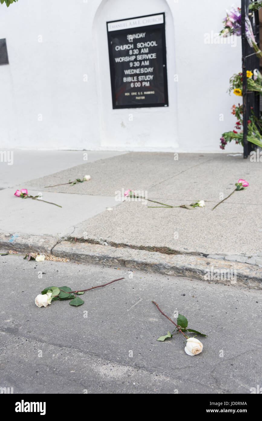 Charleston, South Carolina, USA. 17th June, 2017. Roses on the ground in front of the Mother Emanuel African Methodist Episcopal Church on the 2nd anniversary of the mass shooting June 17, 2017 in Charleston, South Carolina. Nine members of the historic African-American church were gunned down by a white supremacist during bible study on June 17, 2015. Credit: Planetpix/Alamy Live News Stock Photo