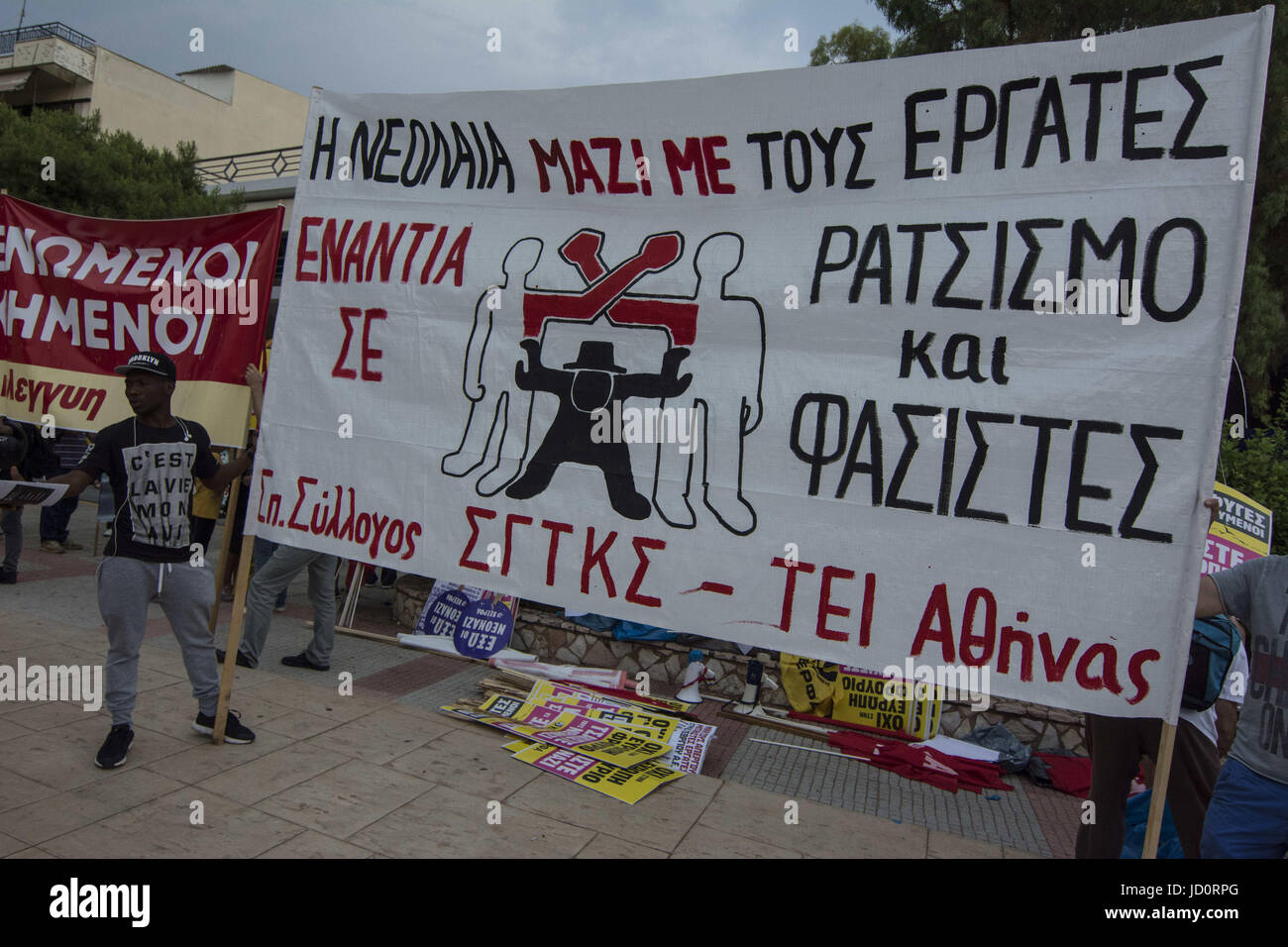 Athens, Greece. 17th June, 2017. Leftists, anarchists, anti-racism organization members and migrants march in the streets of Apropyrgos, on the outskirts of Athens, to protest against recent racist attacks to migrant workers by neo-nazi gangs. Credit: Nikolas Georgiou/ZUMA Wire/Alamy Live News Stock Photo