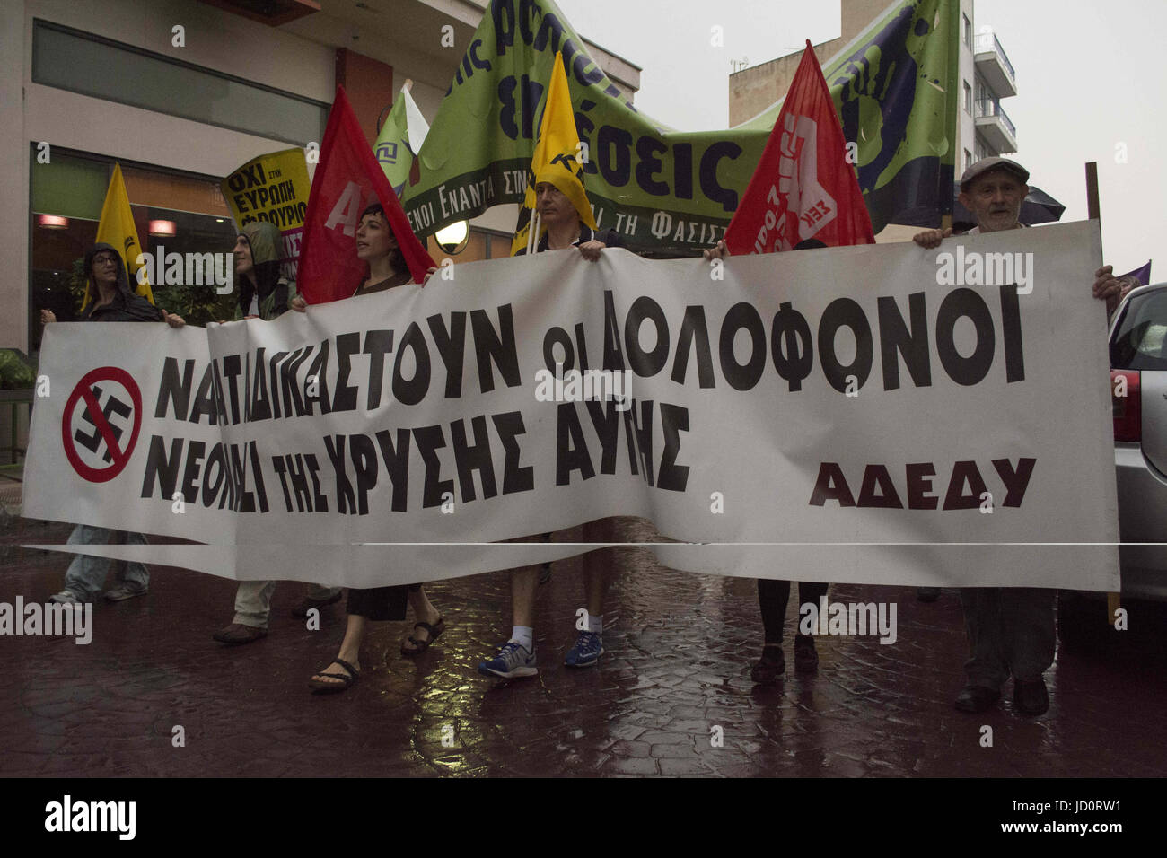 Athens, Greece. 17th June, 2017. Leftists, anarchists, anti-racism organization members and migrants march in the streets of Apropyrgos, on the outskirts of Athens, to protest against recent racist attacks to migrant workers by neo-nazi gangs. Credit: Nikolas Georgiou/ZUMA Wire/Alamy Live News Stock Photo