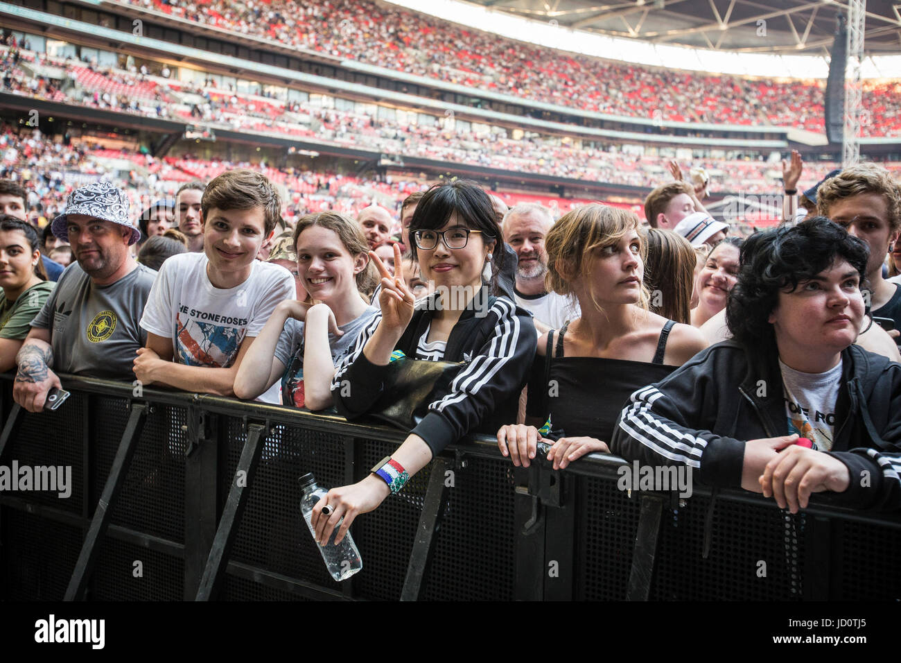 London, UK. 17th June, 2017. Crowd members at The Stone Roses sell out ...