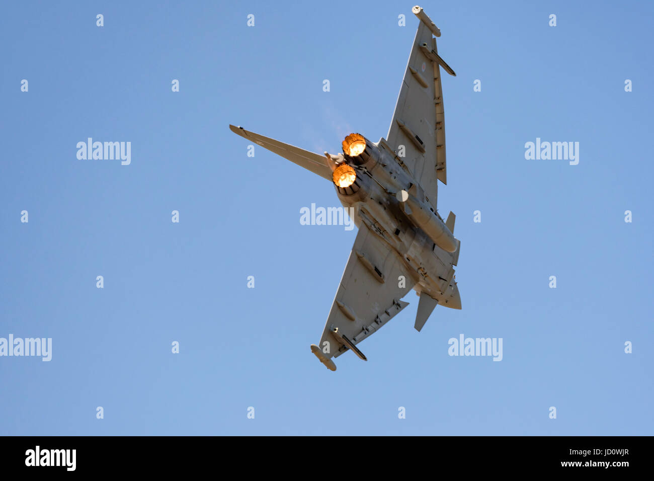 Weston-super-Mare, UK. 17th June, 2017. The RAF Typhoon Display Team lighting up the burners on their display routine in blue skies, on a summer day in Weston-super-Mare, UK. Credit: Bob Sharples/Alamy Live News Stock Photo