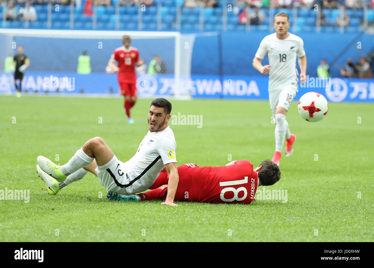 St. Petersburg, Russia. 17th June, 2017. Yury Zhirkov (R) of Russia vies with Michael Boxall of New Zealand during the group A match between Russia and New Zealand of the 2017 FIFA Confederations Cup in St. Petersburg, Russia, on June 17, 2017. Russia won 2-0. Credit: Xu Zijian/Xinhua/Alamy Live News Stock Photo