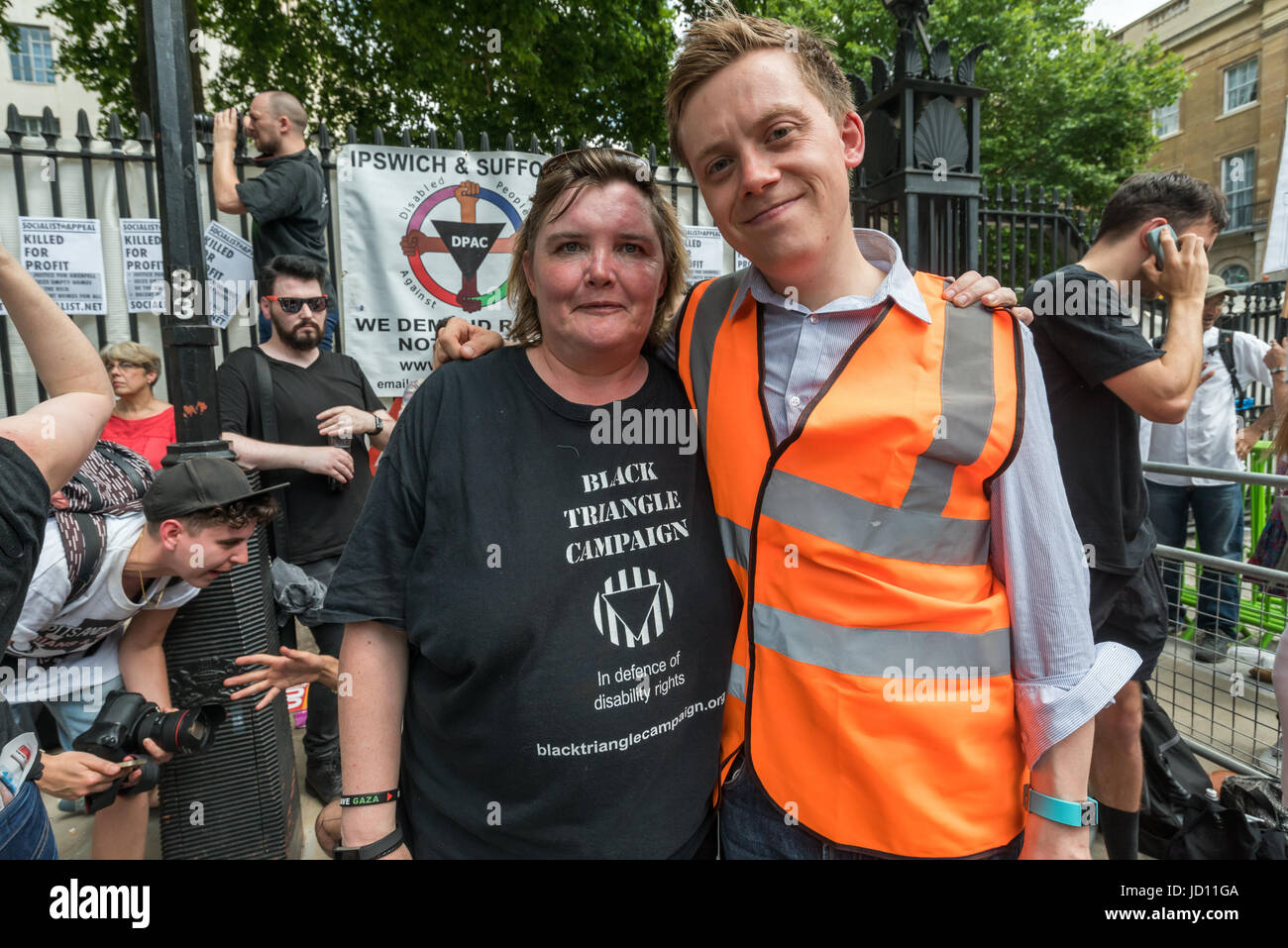 June 17, 2017 - London, UK - London, UK. 17th June, 2017. Paula Peters of DPAC and protest organiser Owen Jones at the Downing St protest calling on Theresa May to resign. Mostly made up of vocal supporters of Jeremy Corbyn, buoyed up by the election results which showed him to be eminently electable, there were speeches by Labour MPs Marsha De Cordova who gained Battersea from the Conservatives, Rupa Huq who greatly increased her tiny majority and Shadow Education Secretary Angela Rayner. There were others who spoke about the DUP, as a party intrinsically linked with Protestant terrorist grou Stock Photo