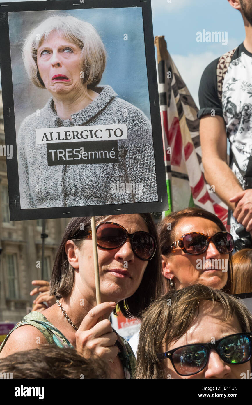 June 17, 2017 - London, UK - London, UK. 17th June, 2017. A protest at Downing St calls on Theresa May to resign. Mostly made up of vocal supporters of Jeremy Corbyn, buoyed up by the election results which showed him to be eminently electable, there were speeches by Labour MPs Marsha De Cordova who gained Battersea from the Conservatives, Rupa Huq who greatly increased her tiny majority and Shadow Education Secretary Angela Rayner. There were others who spoke about the DUP, as a party intrinsically linked with Protestant terrorist groups and dominated by a homophobic church which represents a Stock Photo
