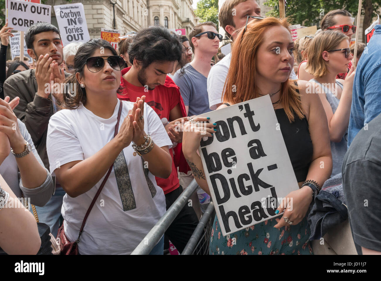 June 17, 2017 - London, UK - London, UK. 17th June, 2017. A protest at Downing St calls on Theresa May to resign. Mostly made up of vocal supporters of Jeremy Corbyn, buoyed up by the election results which showed him to be eminently electable, there were speeches by Labour MPs Marsha De Cordova who gained Battersea from the Conservatives, Rupa Huq who greatly increased her tiny majority and Shadow Education Secretary Angela Rayner. There were others who spoke about the DUP, as a party intrinsically linked with Protestant terrorist groups and dominated by a homophobic church which represents a Stock Photo