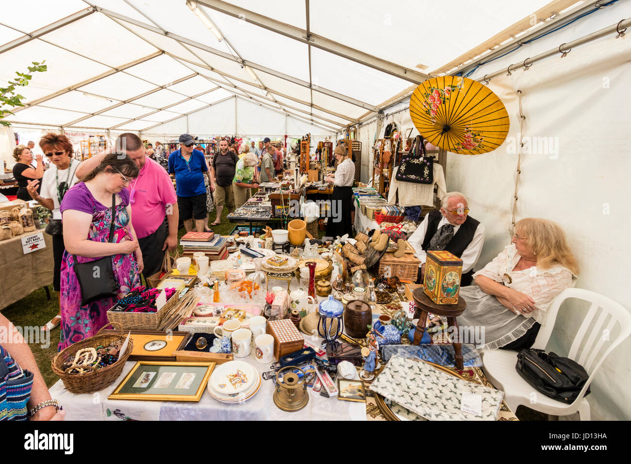 Tented area with arts and crafts market. Various stalls set up selling ...