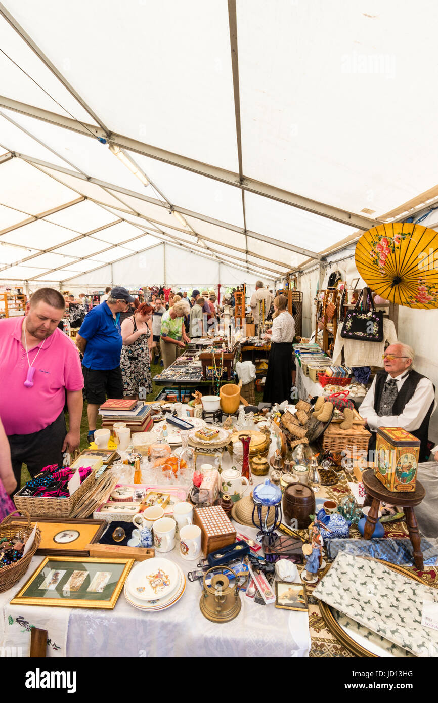 Tented area with arts and crafts market. Various stalls set up selling