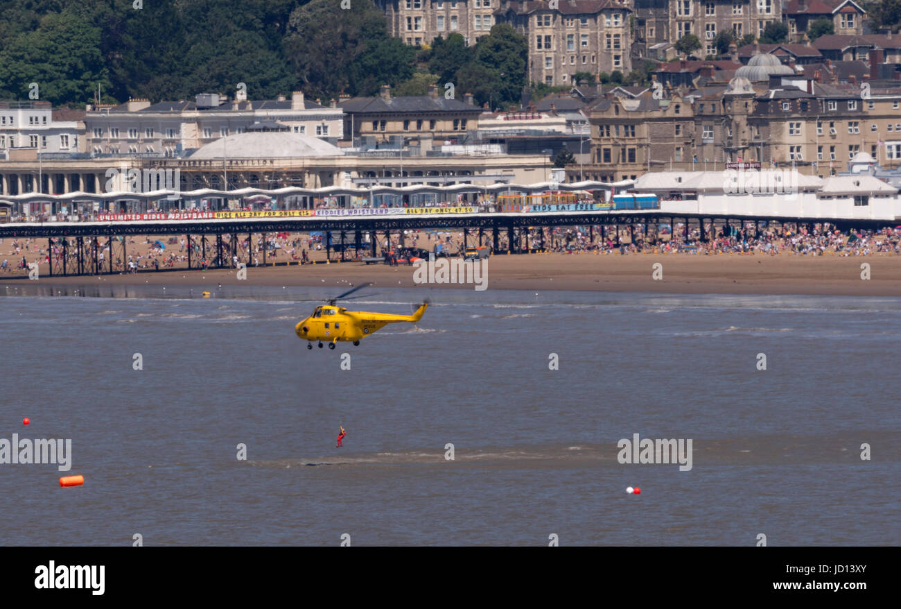 Hot weather in the UK, brought out large crowds for the Weston Air Festival at Weston-super-Mare, here the Whirlwind HAR Mark 10 carrying out a Search and Rescue demonstration Credit: Bob Sharples/Alamy Live News Stock Photo