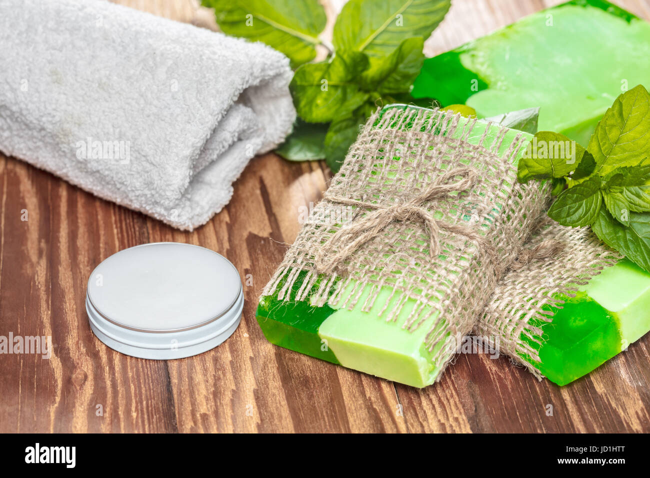 Green mint handmade soap on a wooden background Stock Photo