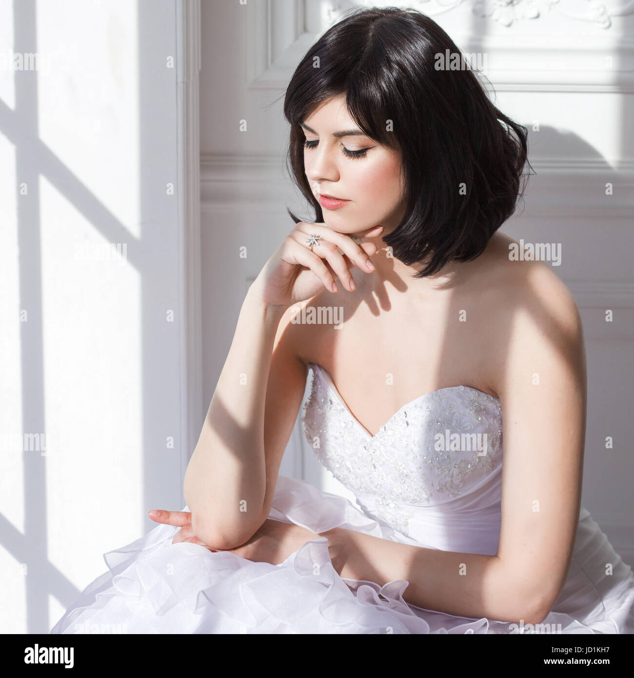 Portrait Of Young Attractive Brunette With Short Hair In A Wedding