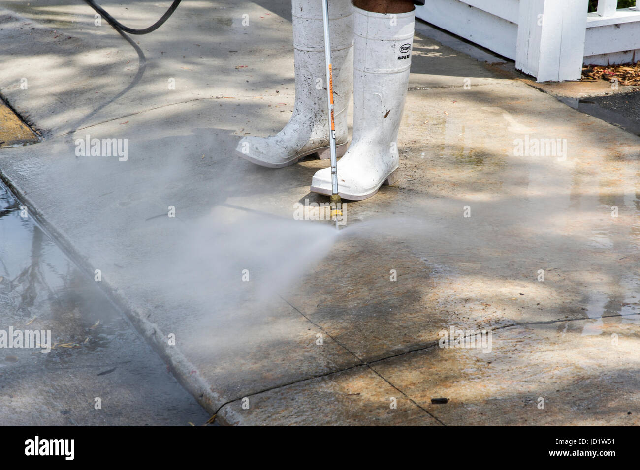 Power Washing Sidewalks Stock Photo Alamy